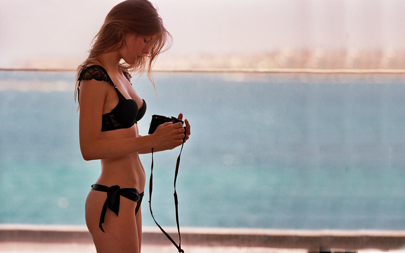 lace cup bra and tie-side thong by the sea